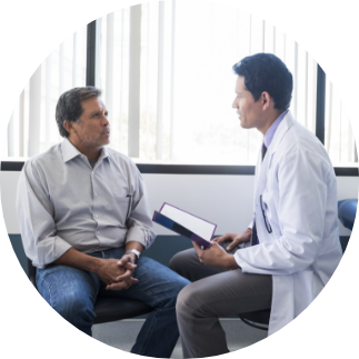 Male patient with male doctor in exam room