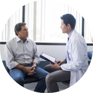 Male patient with male doctor in exam room